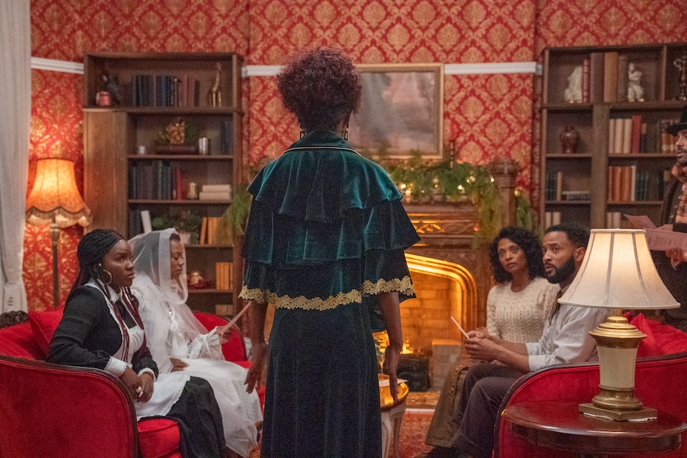 Bea addresses Desiree, Deborah, Evelyn and Calvin at the murder mystery party