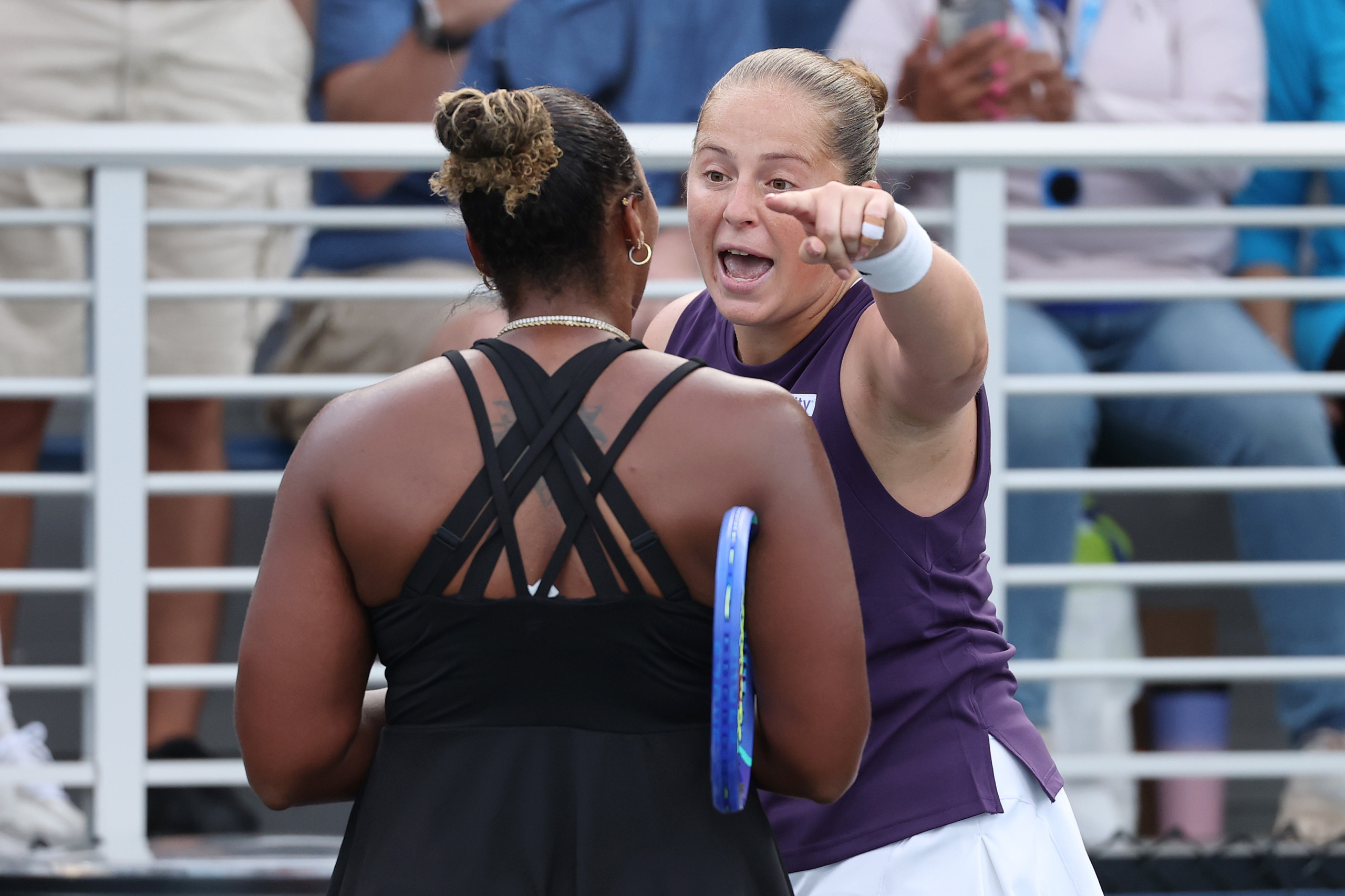 Jelena Ostapenko of Latvia (R) argues with Taylor Townsend of the United States (L) at 2025 US Open.