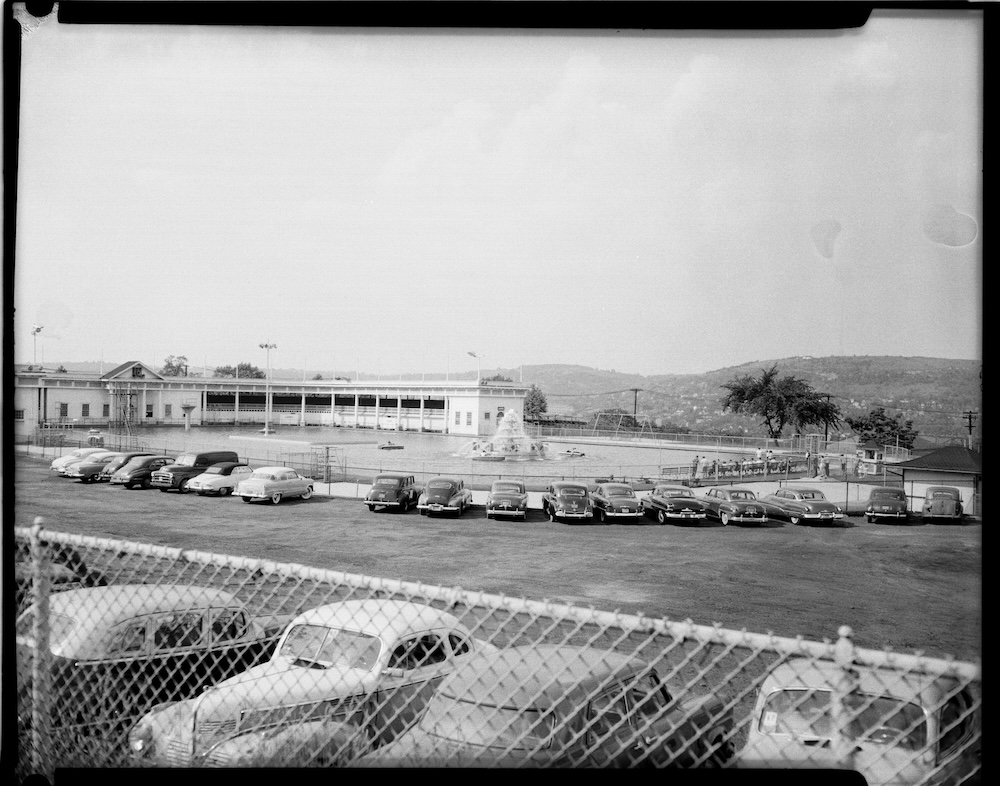 Charles “Teenie” Harris (American, 1908-1998);Kennywood parking lot and pool, Pittsburgh, PA;c. 1953;4×5 black-and-white negative film;overall: 4 × 5 in. (10.2 × 12.7 cm);Heinz Family Fund;Charles “Teenie” Harris, born 1908, Pittsburgh, PA; died 1998, Pittsburgh, PA; Kennywood parking lot and pool, Pittsburgh, PA, ca. 1953, printed 2025, black-and-white negative film, 4 x 5 in. (10.2 × 12.7 cm); Carnegie Museum of Art, Pittsburgh, Heinz Family Fund, 2001.35.1975;2001.35.1975