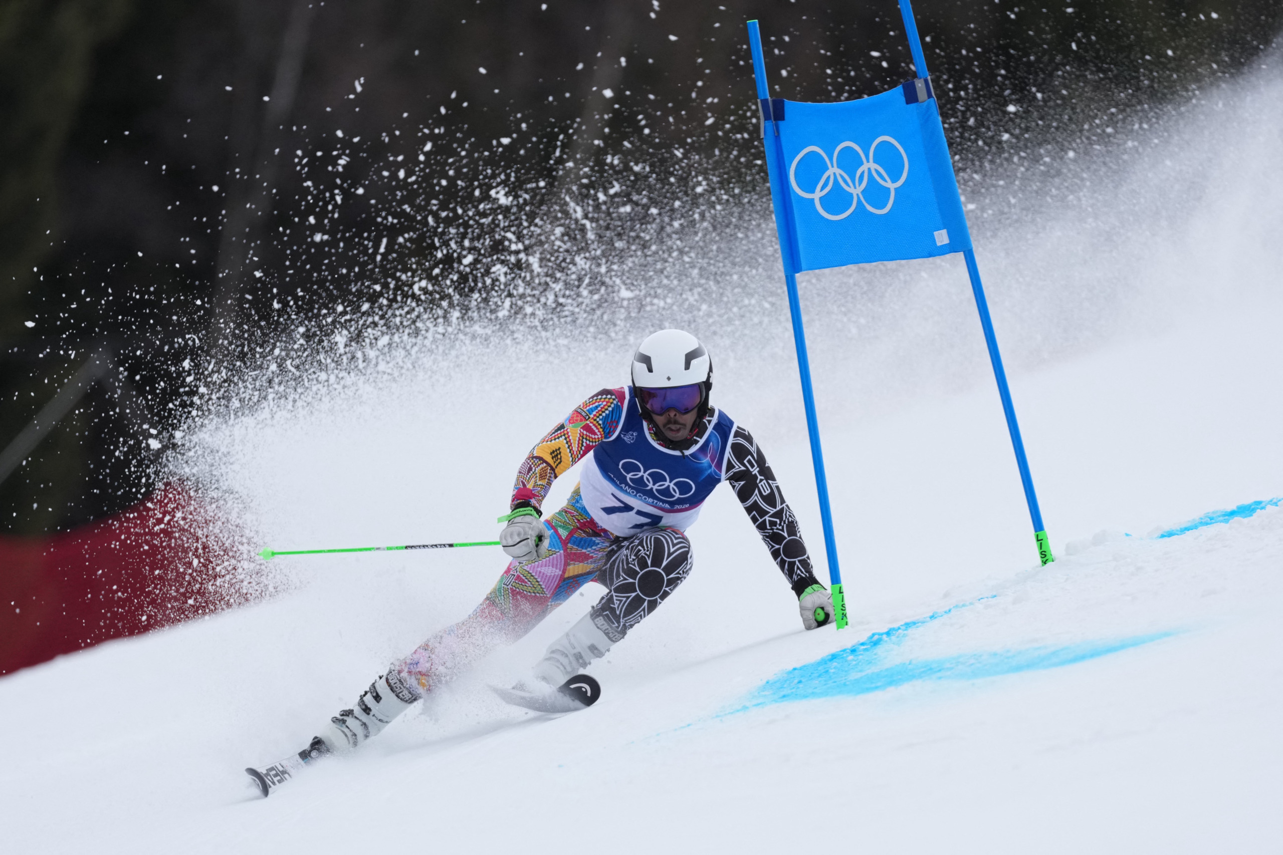 Eritrea's Shannon Abeda competes in the first run of the men's giant slalom alpine skiing event. 