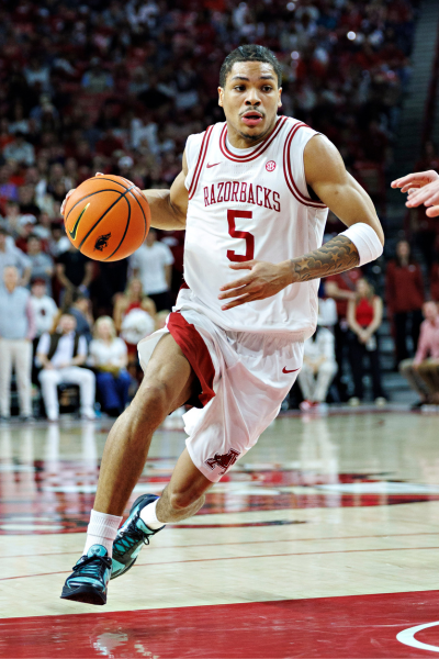 Darius Acuff Jr. #5 of the Arkansas Razorbacks drives to the basket