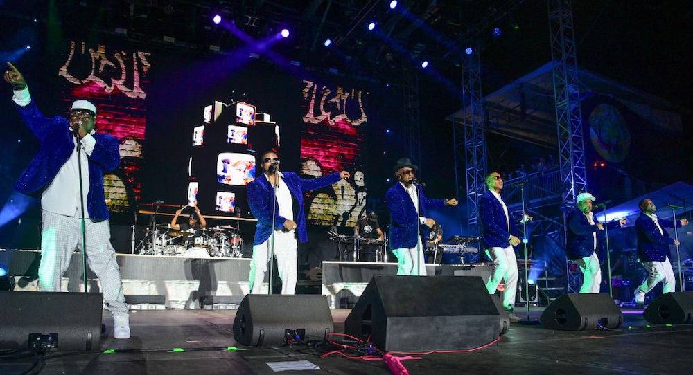: Bobby Brown, Ricky Bell, Ralph Tresvant, Ronnie DeVoe, Michael Bivins, and Johnny Gill of New Edition performs during Day 2 of 2025 Jazz In The Gardens Music Festival at Hard Rock Stadium on March 8, 2025 in Miami Gardens, Florida. (Photo by Prince Williams/WireImage)