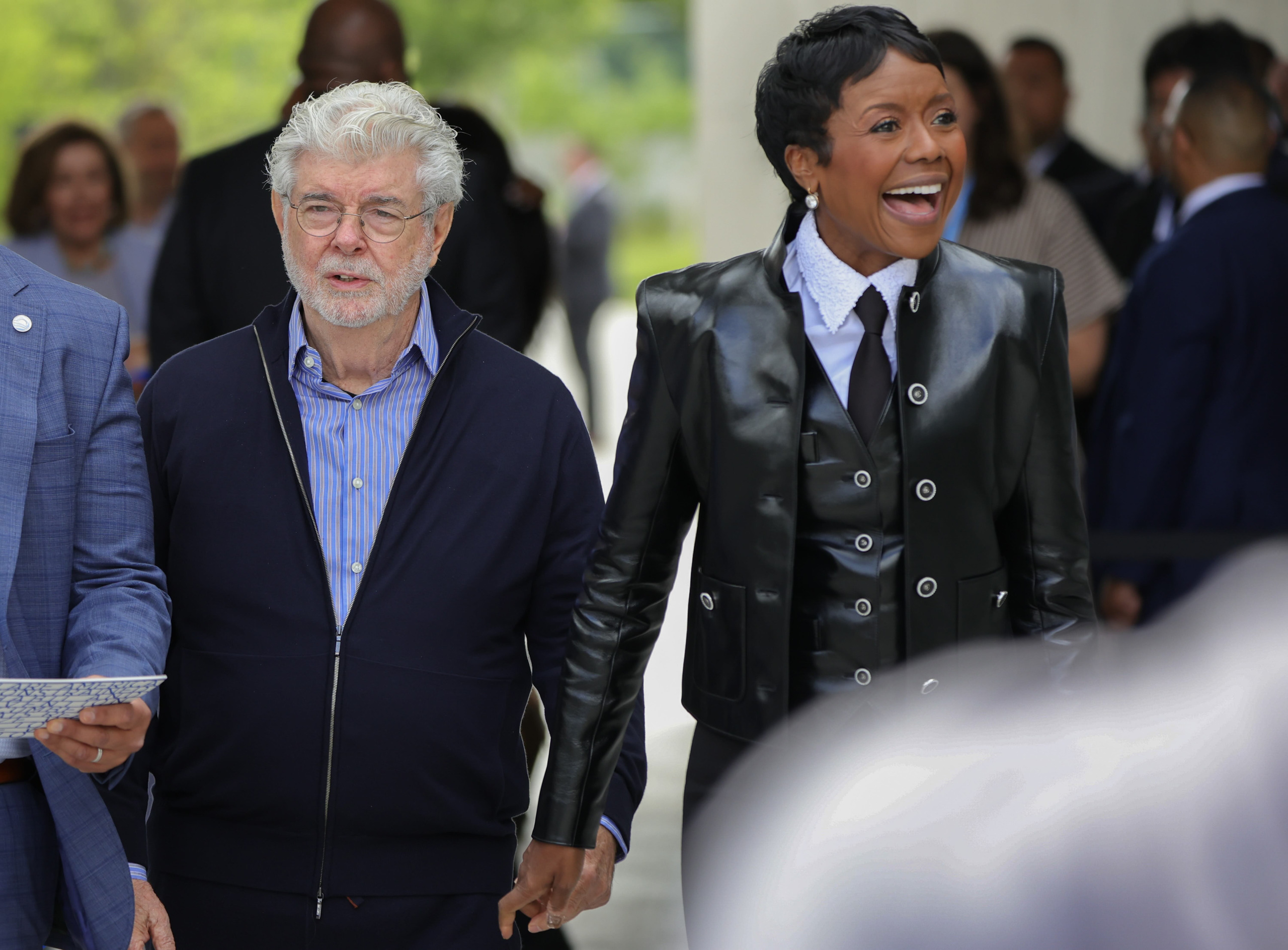 Mellody Hobson and George Lucas. Barack and Michelle Obama. Image: Getty Images